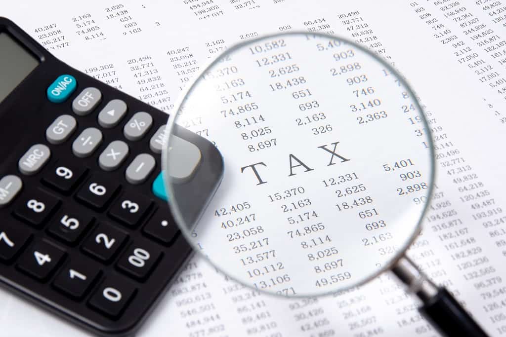 A calculator on financial chart, financial concept