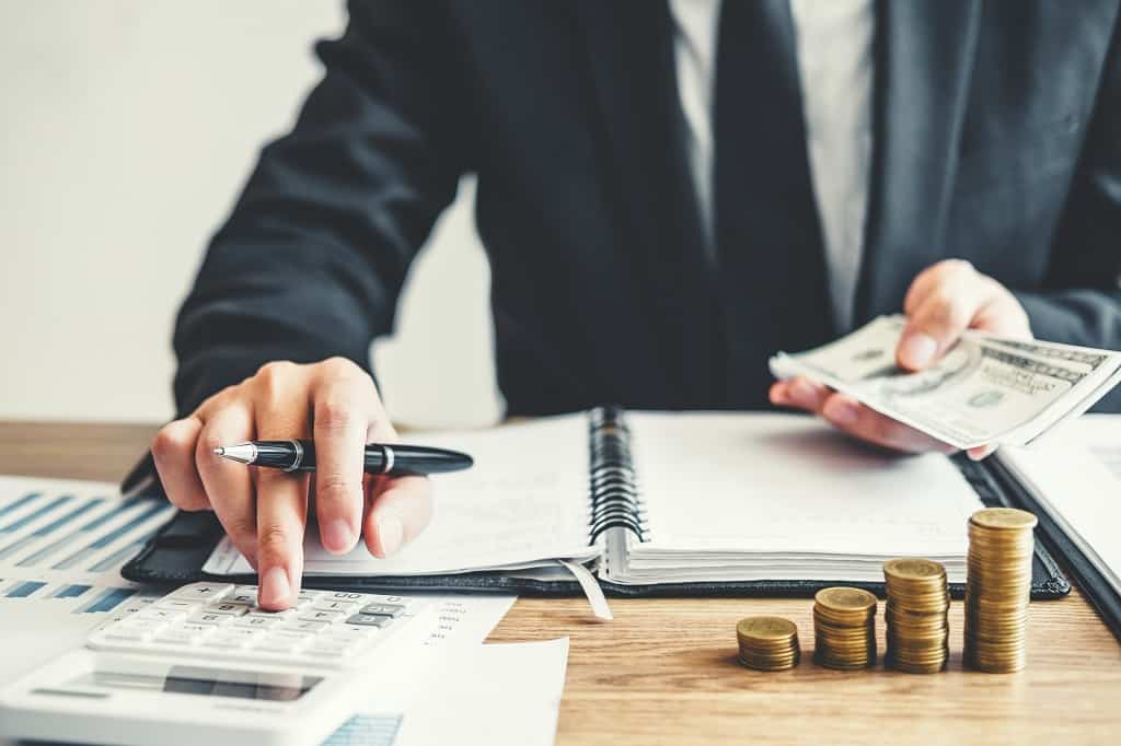 Business man Accounting Calculating Cost Economic budget investment and saving concept