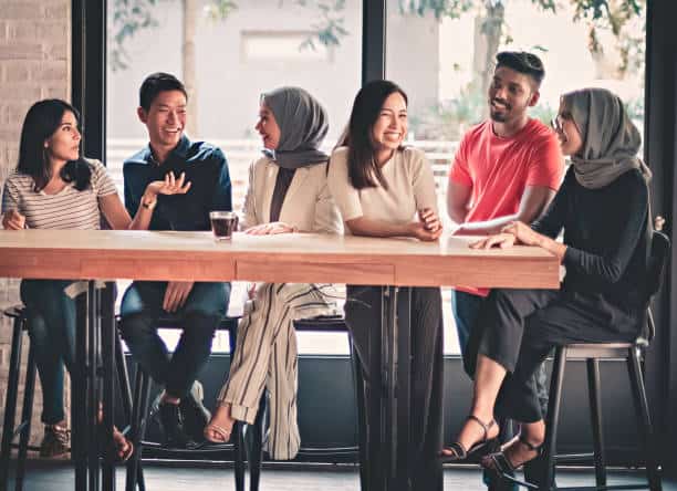 young adults friends gathering at cafe