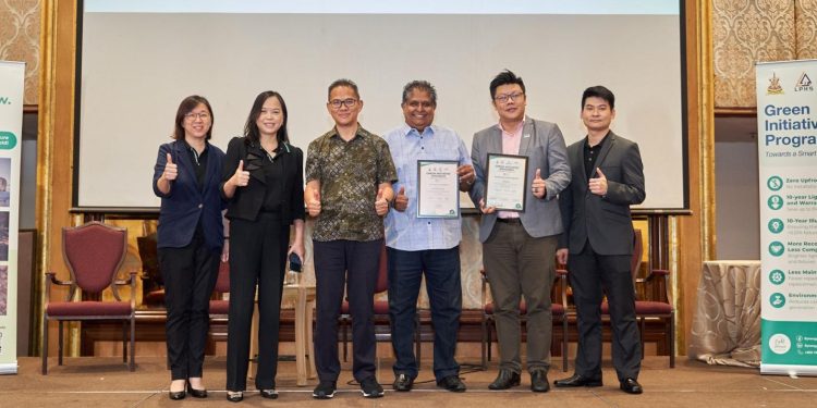 Alex (third to the right) and Ken (second to the right) receive the Green Pioneer Recognition Awards from Synergy Esco and LPHS representatives, celebrating their green leadership and sustainability.